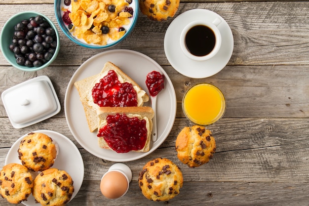 Premium Photo | Toasts with jam, coffee and juice