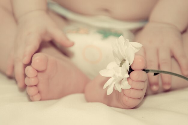 baby feet flowers