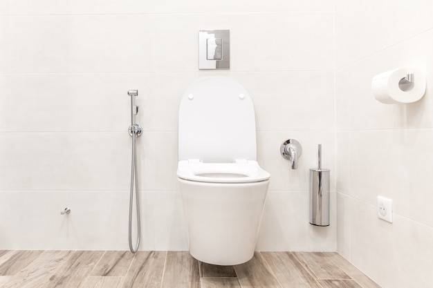 Toilet bowl in modern bathroom Premium Photo