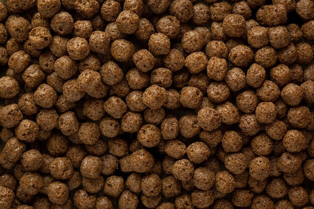 Premium Photo | Top photo of spherical shaped chocolate cereal grains