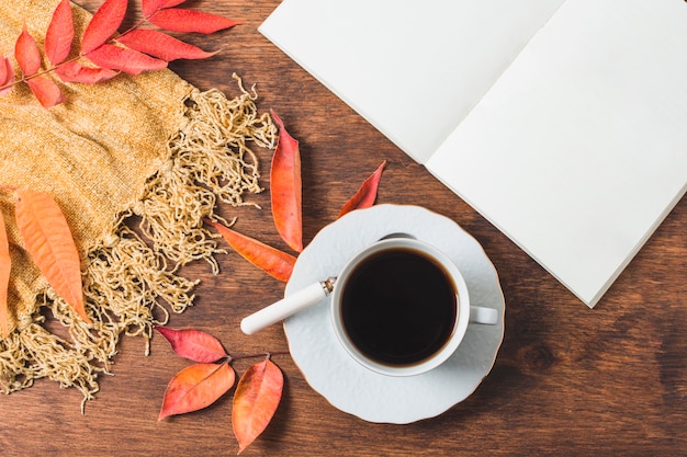 Top view autumn composition with opened notebook Free Photo