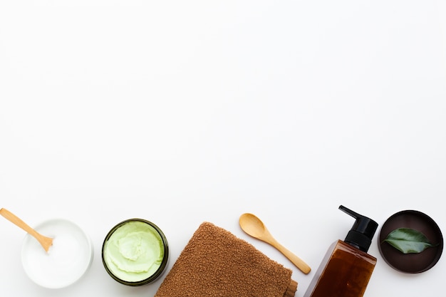 Top view of body butter on white background with copy space Free Photo