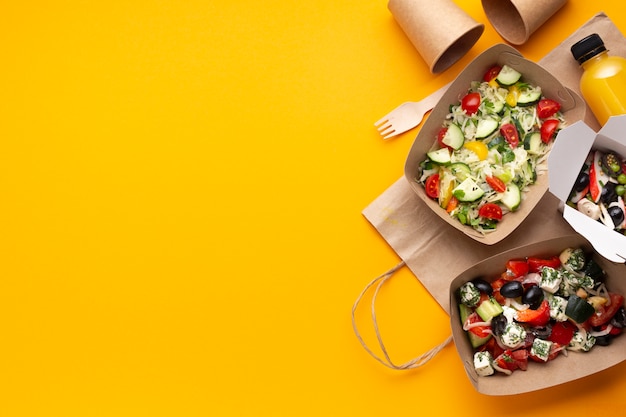 Download Premium Photo Top View Boxes With Salad On Yellow Background Yellowimages Mockups