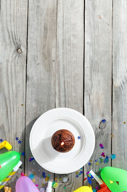 Top View Children Birthday Table Chocolate Muffin Candle