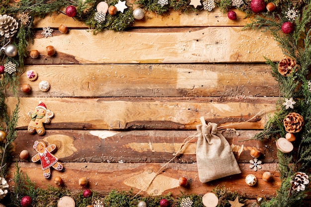 Top view christmas thematic view with pouch Free Photo