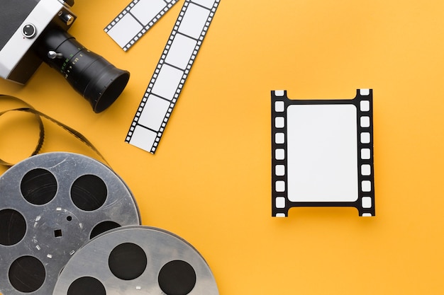 Premium Photo | Top view cinema objects on yellow background