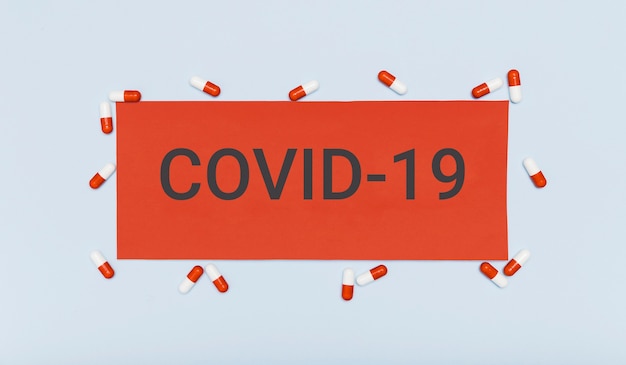Top view of covid-19 coronavirus card | Free Photo