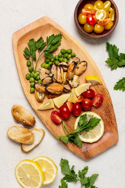 Free Photo | Top View Delicious Food On A Wooden Board