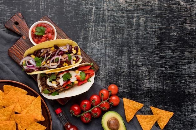 Premium Photo | Top view delicious tacos with vegetables and meat