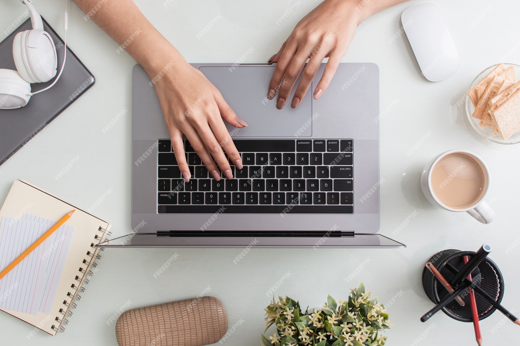 Premium Photo | Top view of desk top with laptop and hands