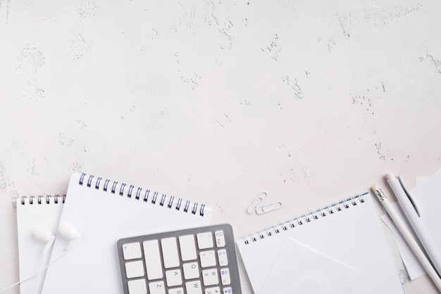 Top View Of Desk With Notepads And Keyboard Photo Free Download