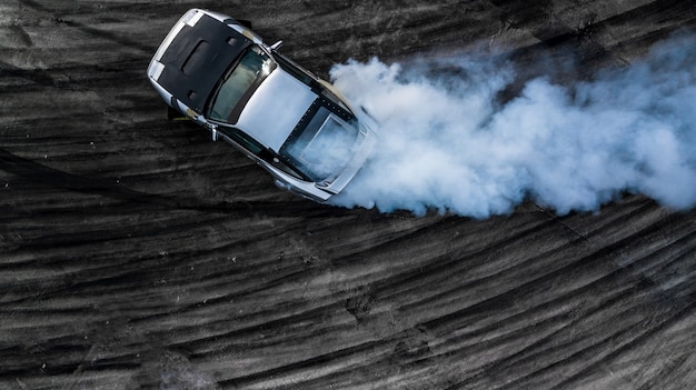 Premium Photo | Top view drifting car, aerial view professional driver ...