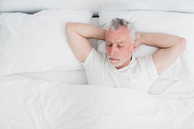 Top view elder man sleeping Photo | Free Download