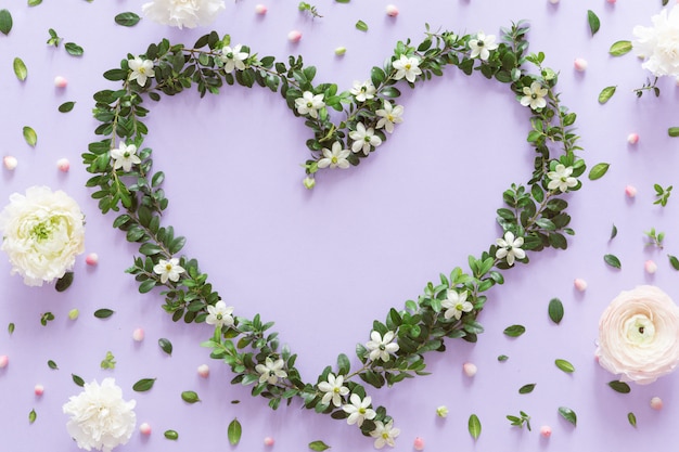 Download Top view of flower heart frame made of wildflowers, buds ...