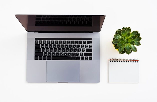 Free Photo | Top view laptop with white background