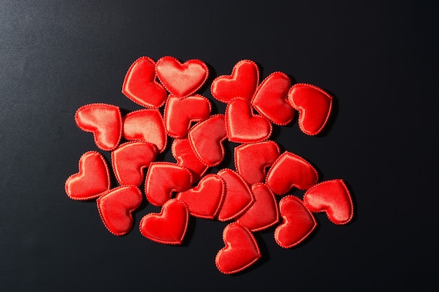 premium-photo-top-view-of-little-red-hearts-on-a-black-background