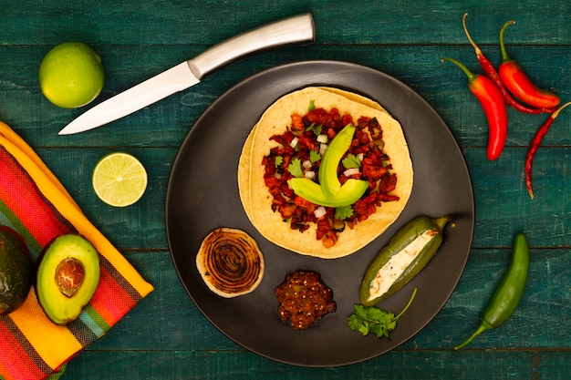 Free Photo | Top view mexican dish with wooden background
