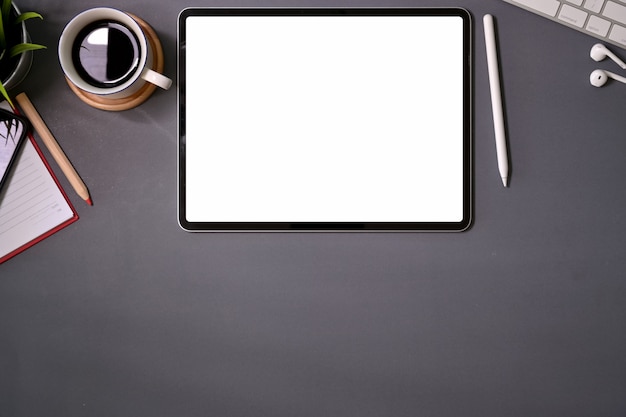 Download Top view mockup blank screen tablet on office desk ...