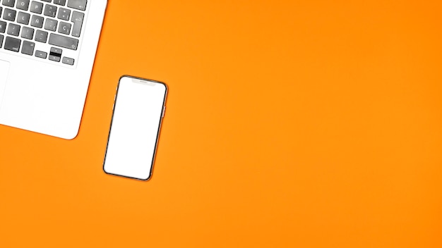 Download Top view mockup smartphone with orange background | Free Photo