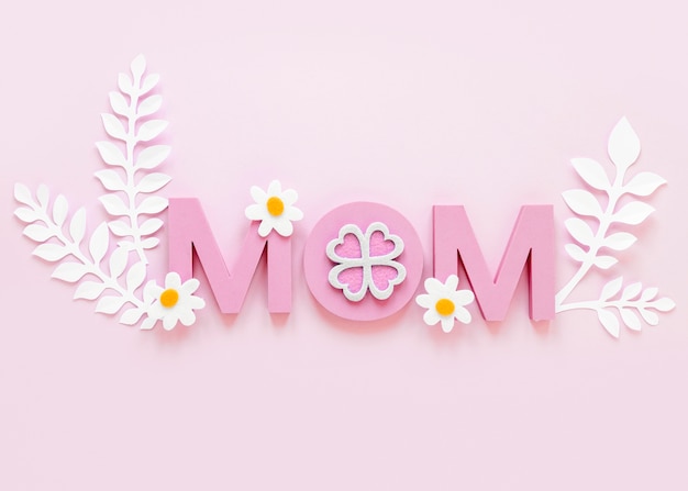 Free Photo | Top view mom word on pink background