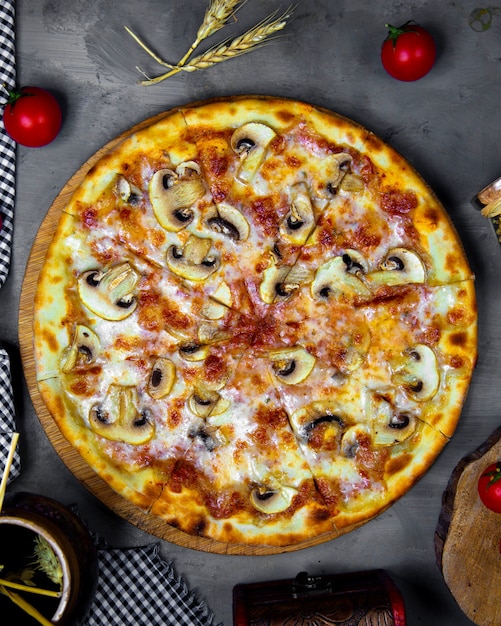 Free Photo Top view of mushroom pizza with tomato sauce and cheese