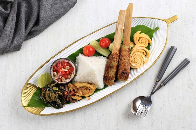 Premium Photo Top View Nasi Campur Bali Popular Balinese Meal Of Rice With Various Side Dish