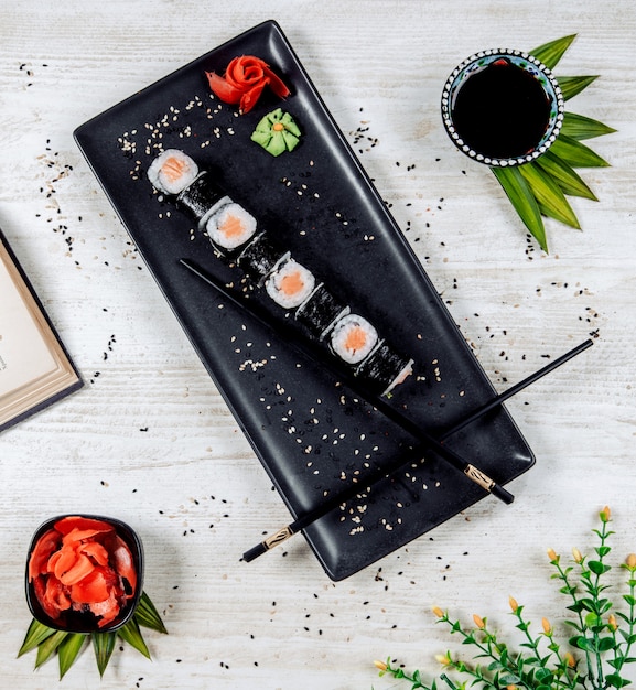 Top view of nori sushi rolls served with ginger and wasabi Free Photo