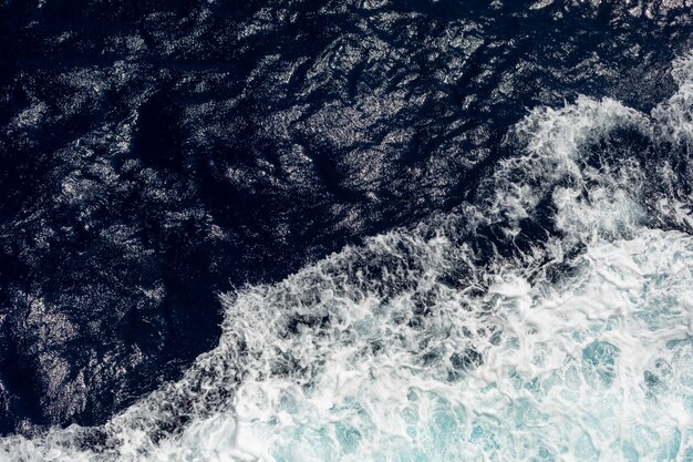 Premium Photo | Top view of the ocean with large waves from the ship ...