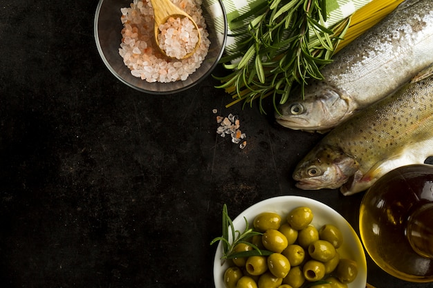 Top view of tasty ingredients on black surface  Photo | Free Download