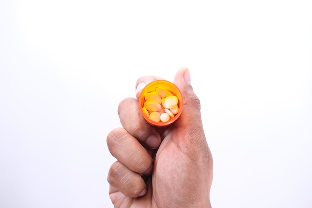 Premium Photo Top View Of Person Hand Holding Pill Container