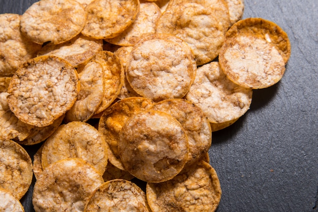 Download Free Top View Pile Of Organic Crispy Baked Whole Grain Rice Chips Use our free logo maker to create a logo and build your brand. Put your logo on business cards, promotional products, or your website for brand visibility.
