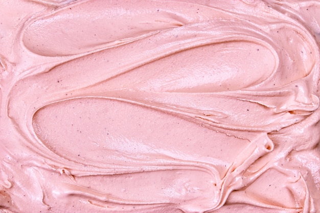 Top view of pink raspberry ice cream surface Premium Photo