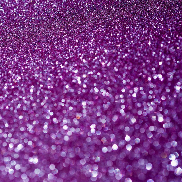 Top view purple glitter background close-up Photo | Free Download