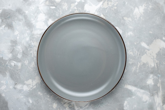 Free Photo | Top view round empty plate grey colored on the light-grey ...