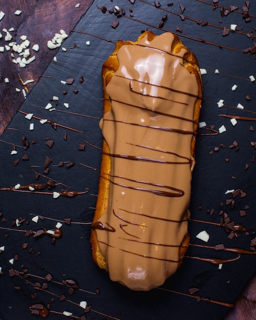 Free Photo | Top view of traditional french eclair decorated with milk ...