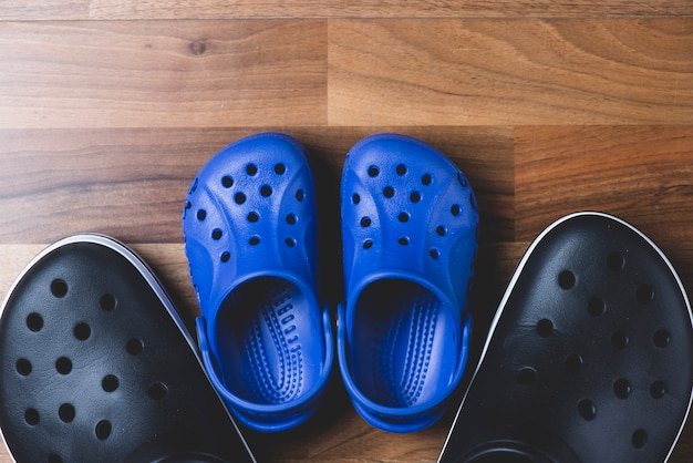 Free Photo | Top view of two pairs of plastic shoes