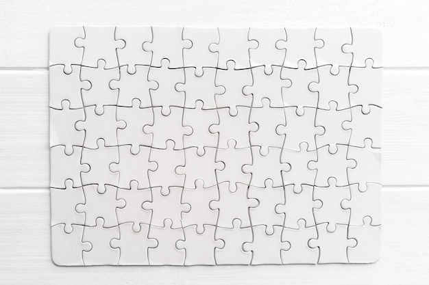 Premium Photo | Top view of white jigsaw puzzle