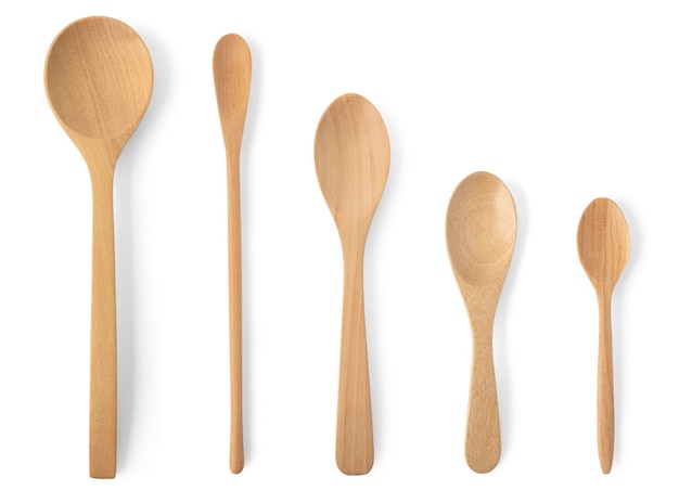 Premium Photo | Top view wooden spoon different sizes isolated