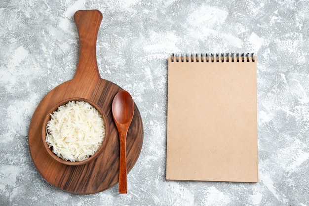 Free Photo | Top view yummy cooked rice inside plate on white