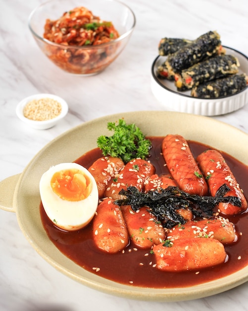 Premium Photo | Topokki or tteokbokki is stirfried rice cake with ...