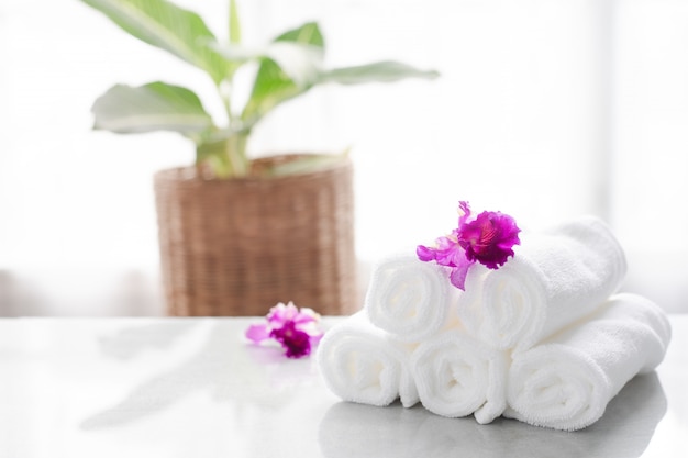 Towels on table with copy space blurred bathroom background. for product display montage. Premium Photo