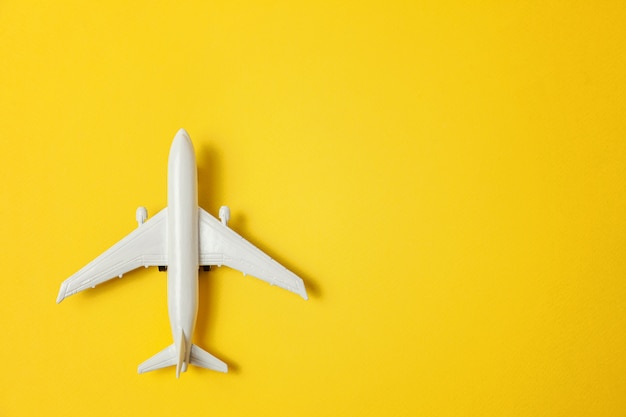Download Premium Photo Toy Plane On Colorful Yellow Background Yellowimages Mockups