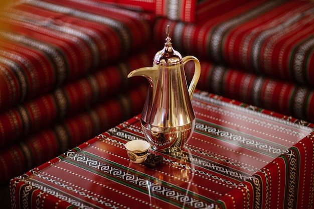 Premium Photo Traditional Arabic Tea Set And Dried Dates