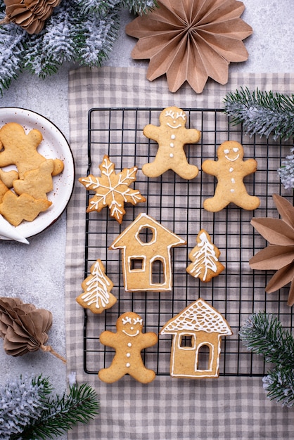 Premium Photo | Traditional christmas gingerbread cookies decorated ...