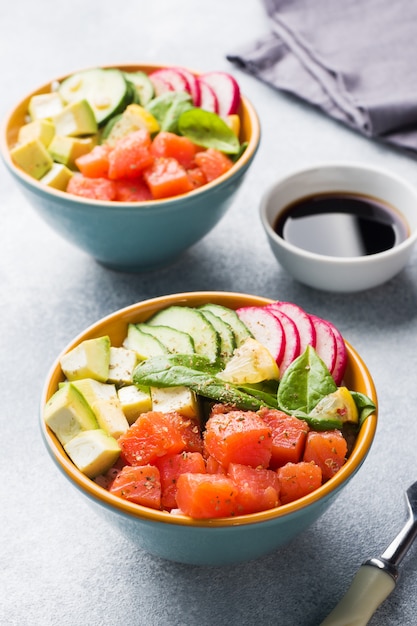 premium-photo-traditional-hawaiian-poke-salad-with-salmon-avocado-rice-and-vegetables-in-a-bowl