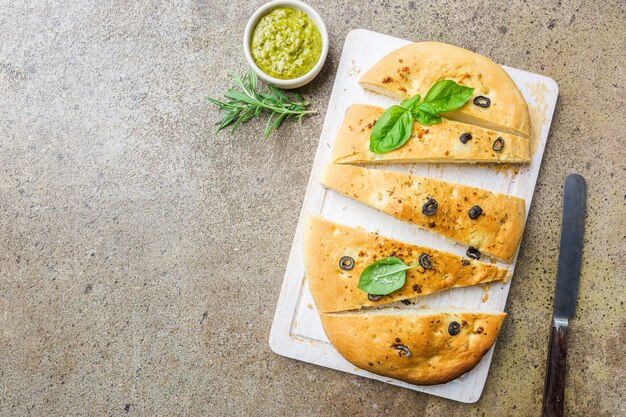 Premium Photo Traditional Italian Focaccia With Black Olives And Rosemary