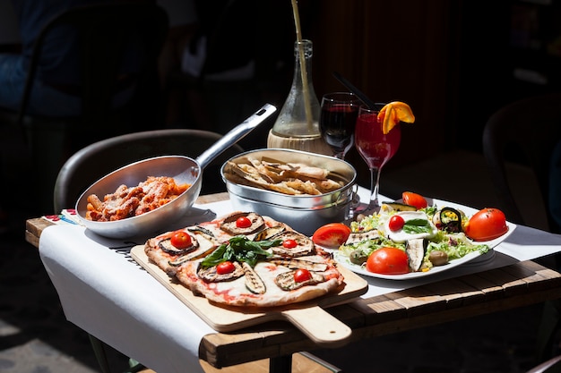 Premium Photo | Traditional italian food in outdoor restaurant