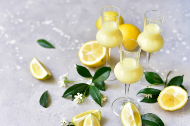 Traditional Italian Liqueur Limoncello With Lemons And Cream Photo