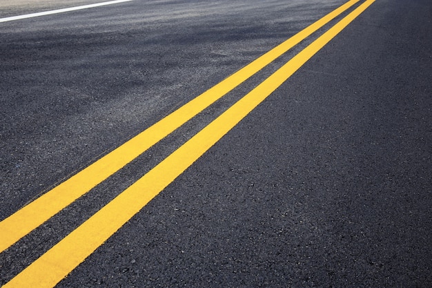 Premium Photo | Traffic line of yellow on street.