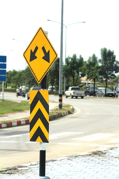 premium-photo-traffic-sign-showing-two-arrows